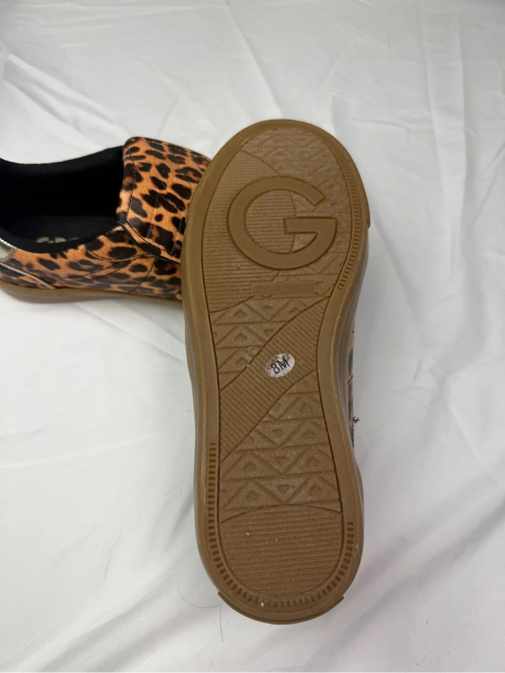 GUESS Leopard Print Slip-On Sneakers with Gold Heel Accent